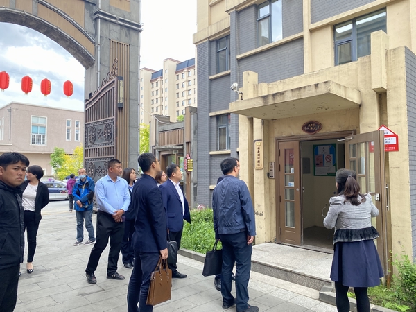 8.评审团旅行相识红色物业建设情形.jpg